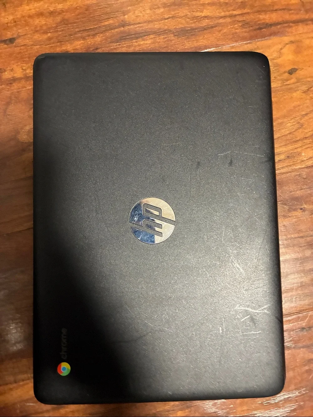 HP Black Chromebook with Silver HP Logo